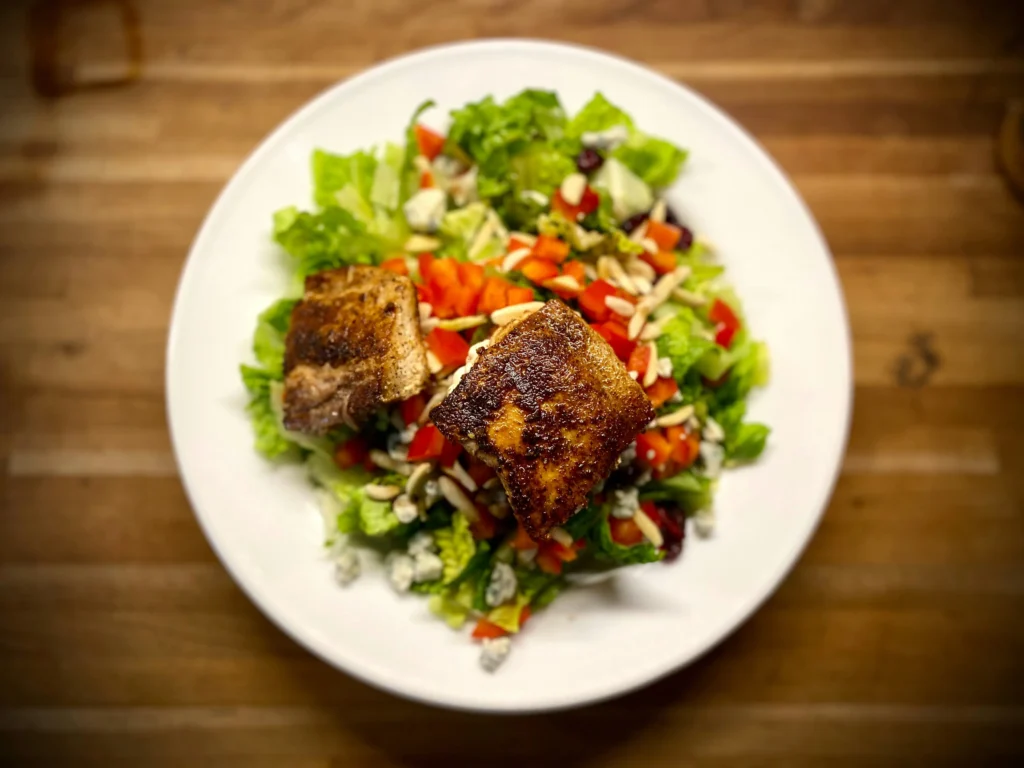 Fresh green salad with grilled chicken