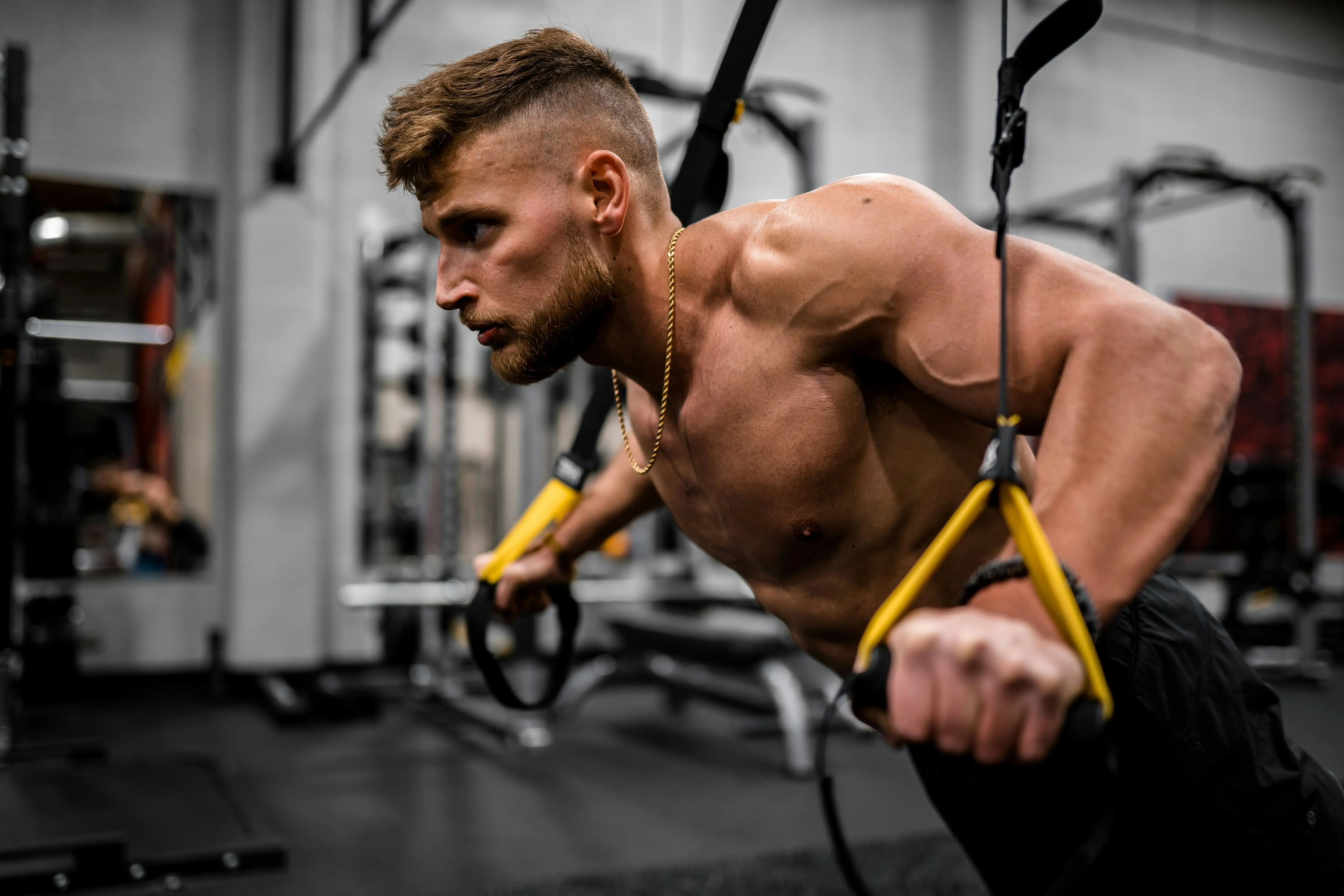 Photo of a man working out in the gym