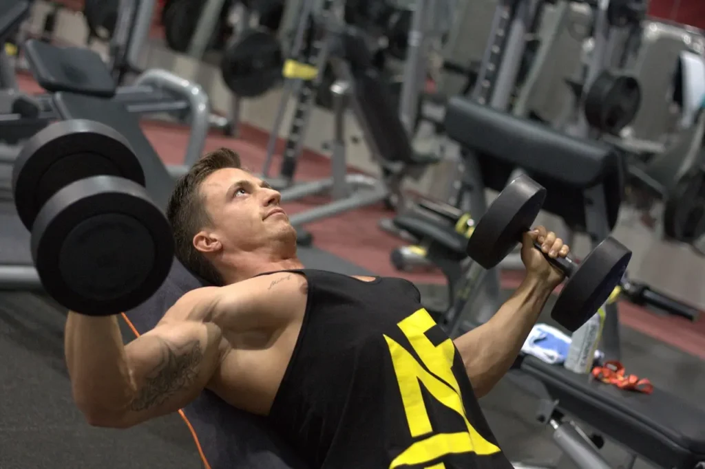 Man lifting dumbbells
