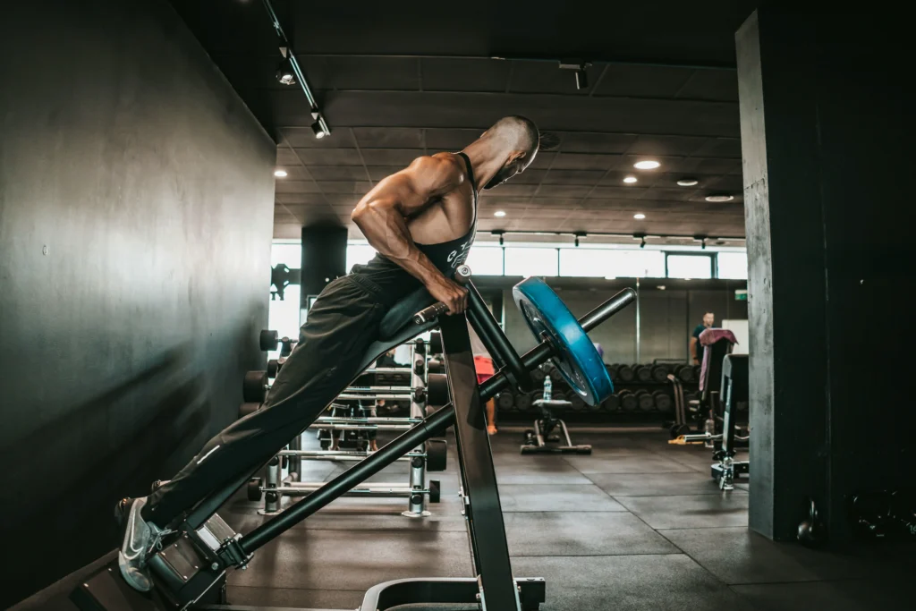 A man training on a gym machine