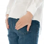 A woman placing her hand on her hip