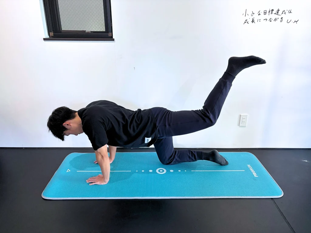 How to perform a back kick exercise step 2