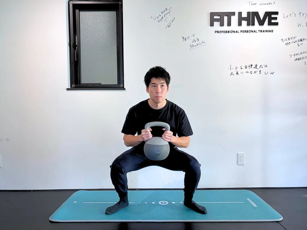 How to perform a goblet squat step 2